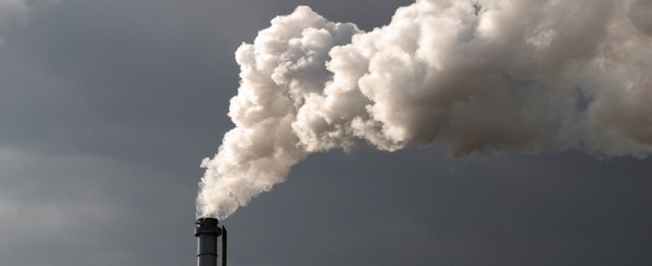 Smokestack Pollution with dark cloud in the background